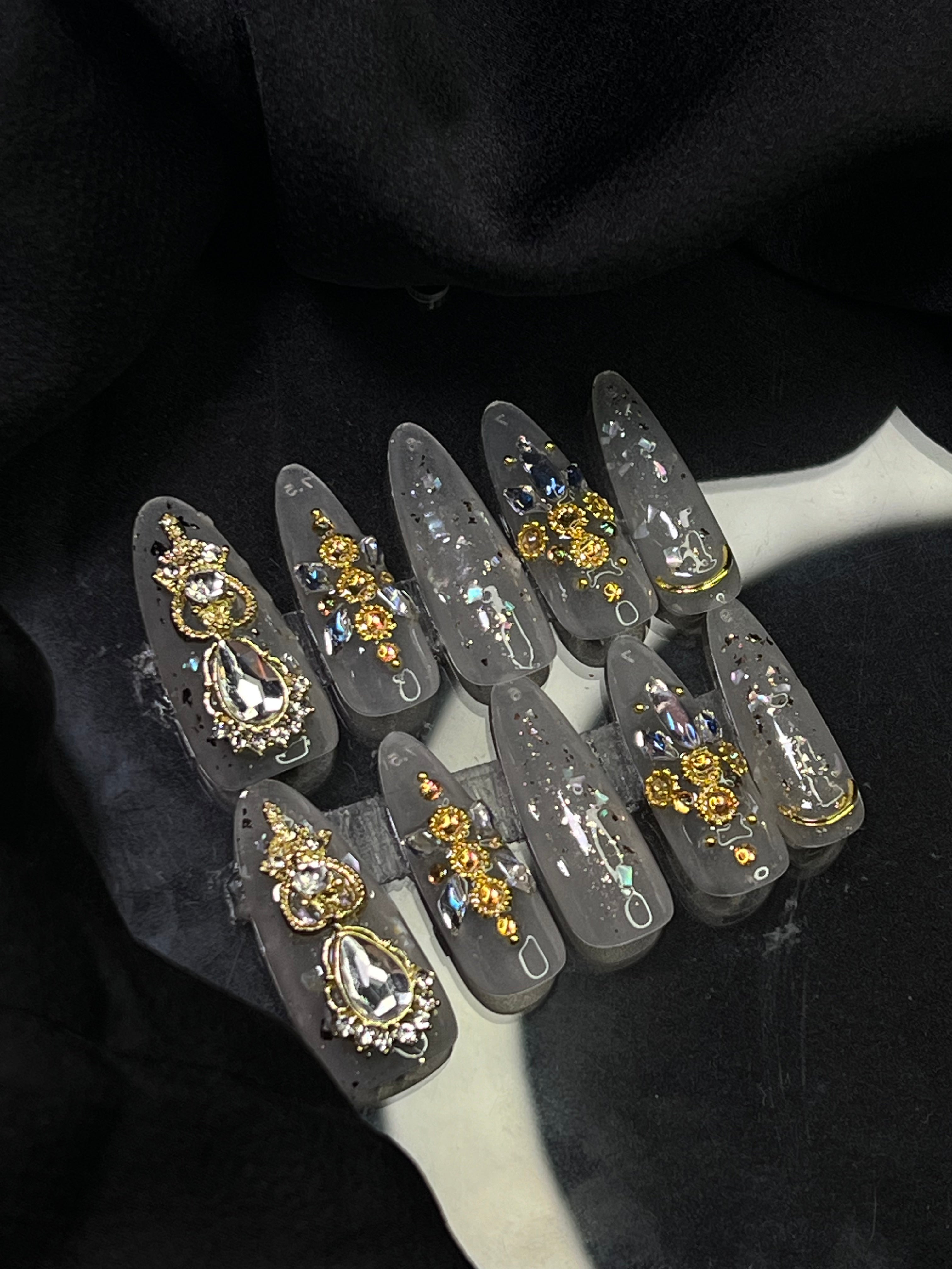 Imperial Gold Aura Press-On Nails with intricate gold and crystal embellishments, perfect for traditional dresses and engagement parties.